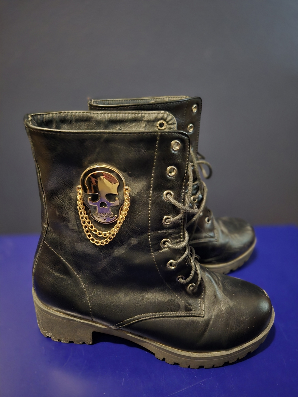 Black Leather Combat Boots with Gold Skull Accent